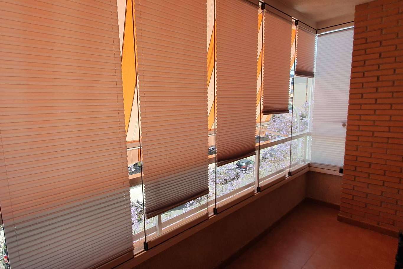 Estores para cortinas de cristal y terrazas acristaladas con la firma Proftek
